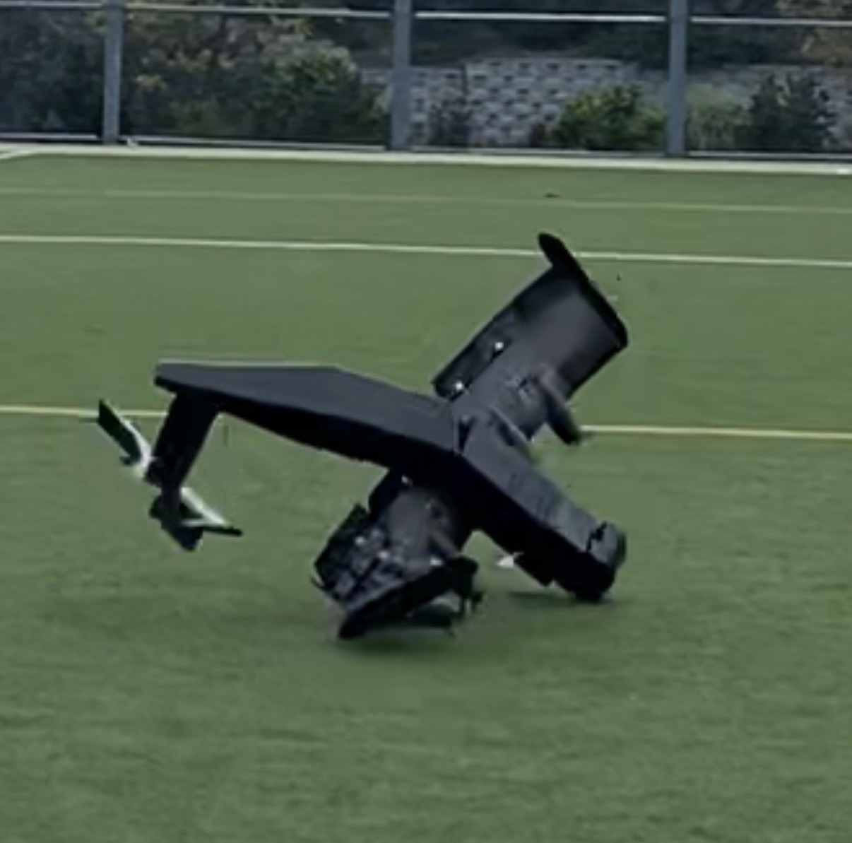 Frame of the WIG vehicle nosing into the practice field at the moment of impact during Flight Test 3.